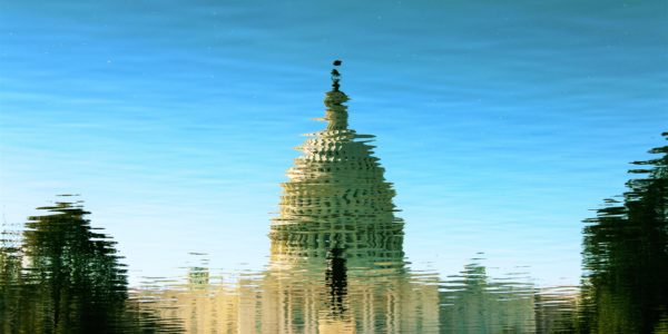 Capital building reflecting in pool