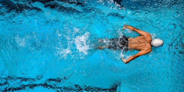 Man swimming in a pool